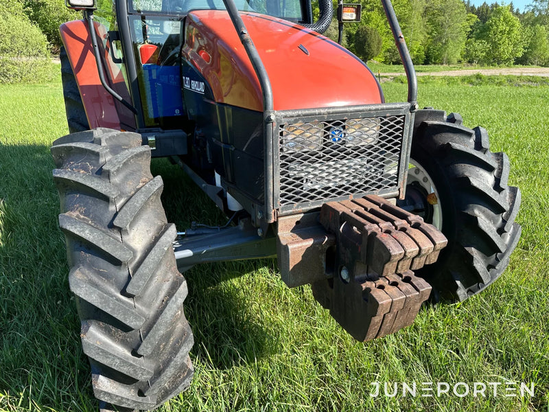 Skogsutrustad New Holland TL80 4WD