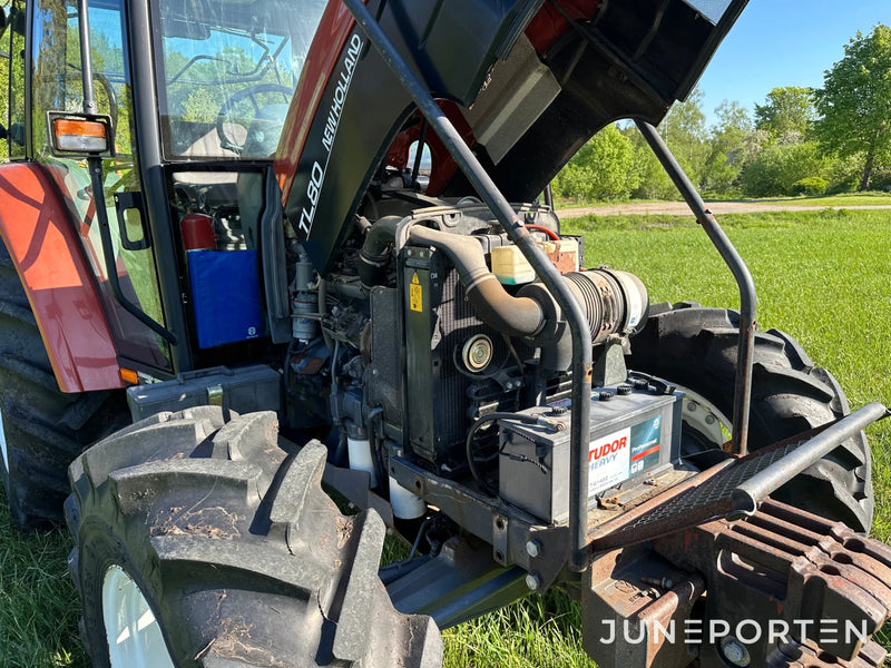 Skogsutrustad New Holland TL80 4WD