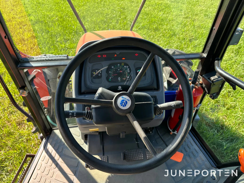 Skogsutrustad New Holland TL80 4WD