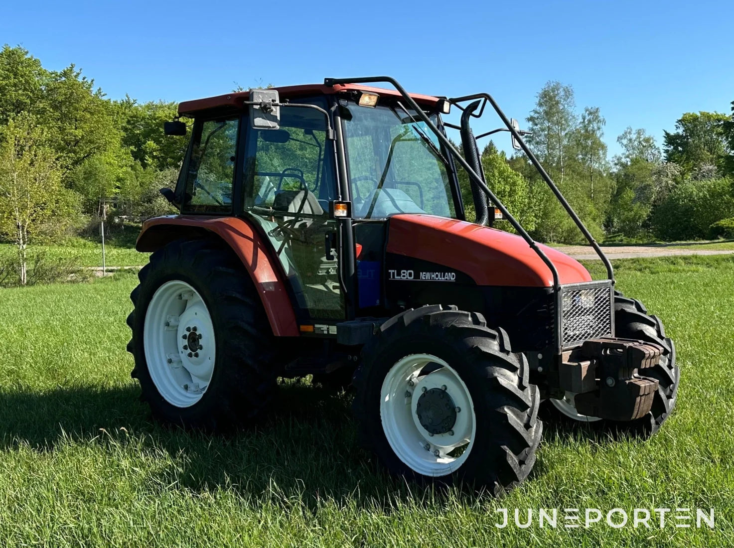 Skogsutrustad New Holland TL80 4WD