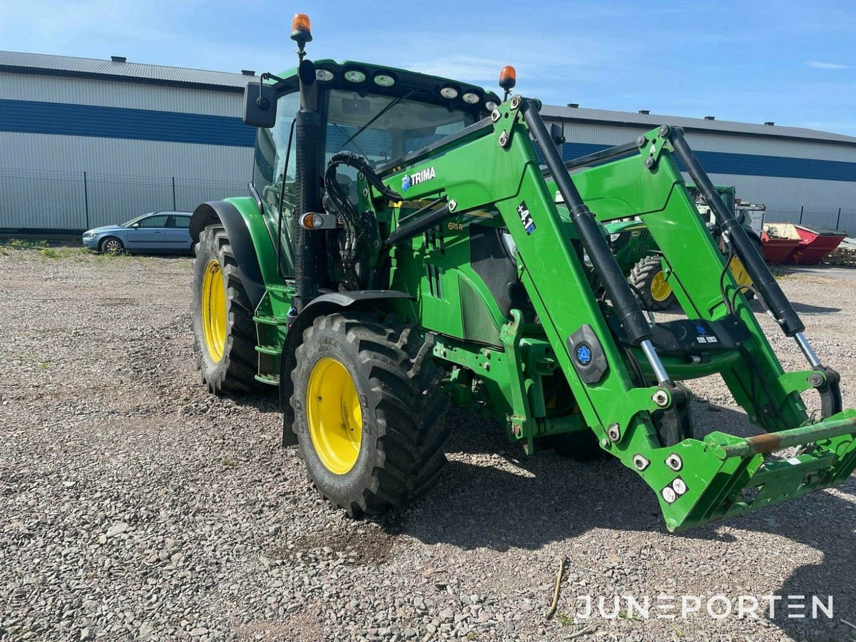 John Deere 6115R med lastare