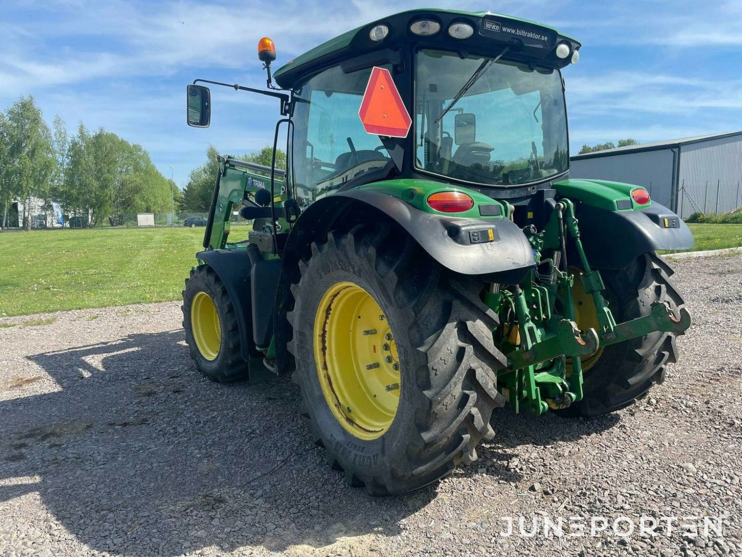 John Deere 6115R med lastare